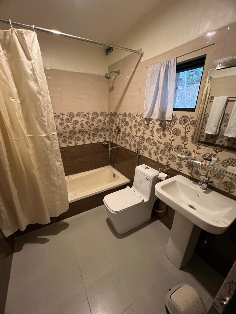 The Lapsi Tree Deluxe Room — photo