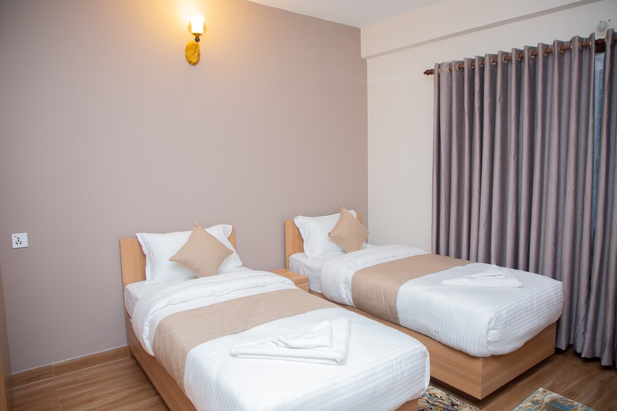 Deluxe Twin Bed Studio Apartment at Lakeside — photo