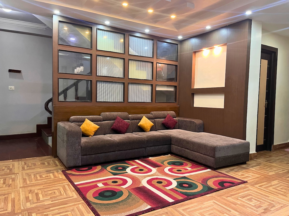 Bright 2BHK Apt in Hattiban with a Cozy Balcony