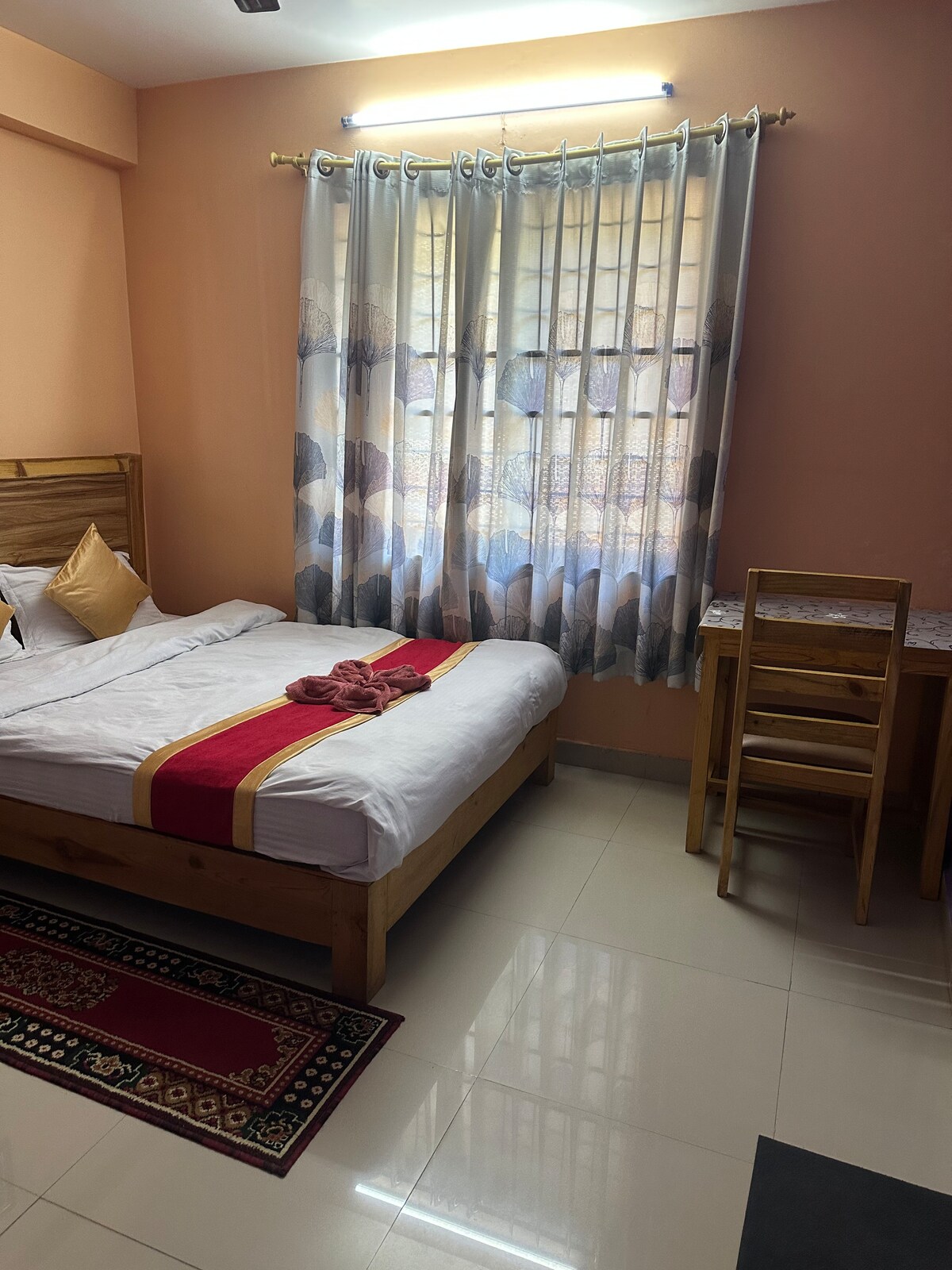 Big room with double windows. Room no 202.