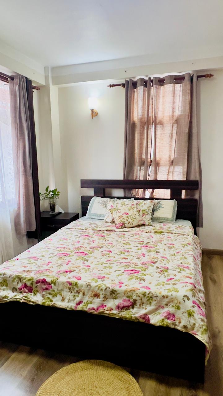 Two BR retreat with Balcony and open living space — photo