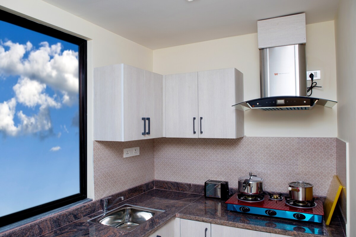 1 BHK Suite — photo